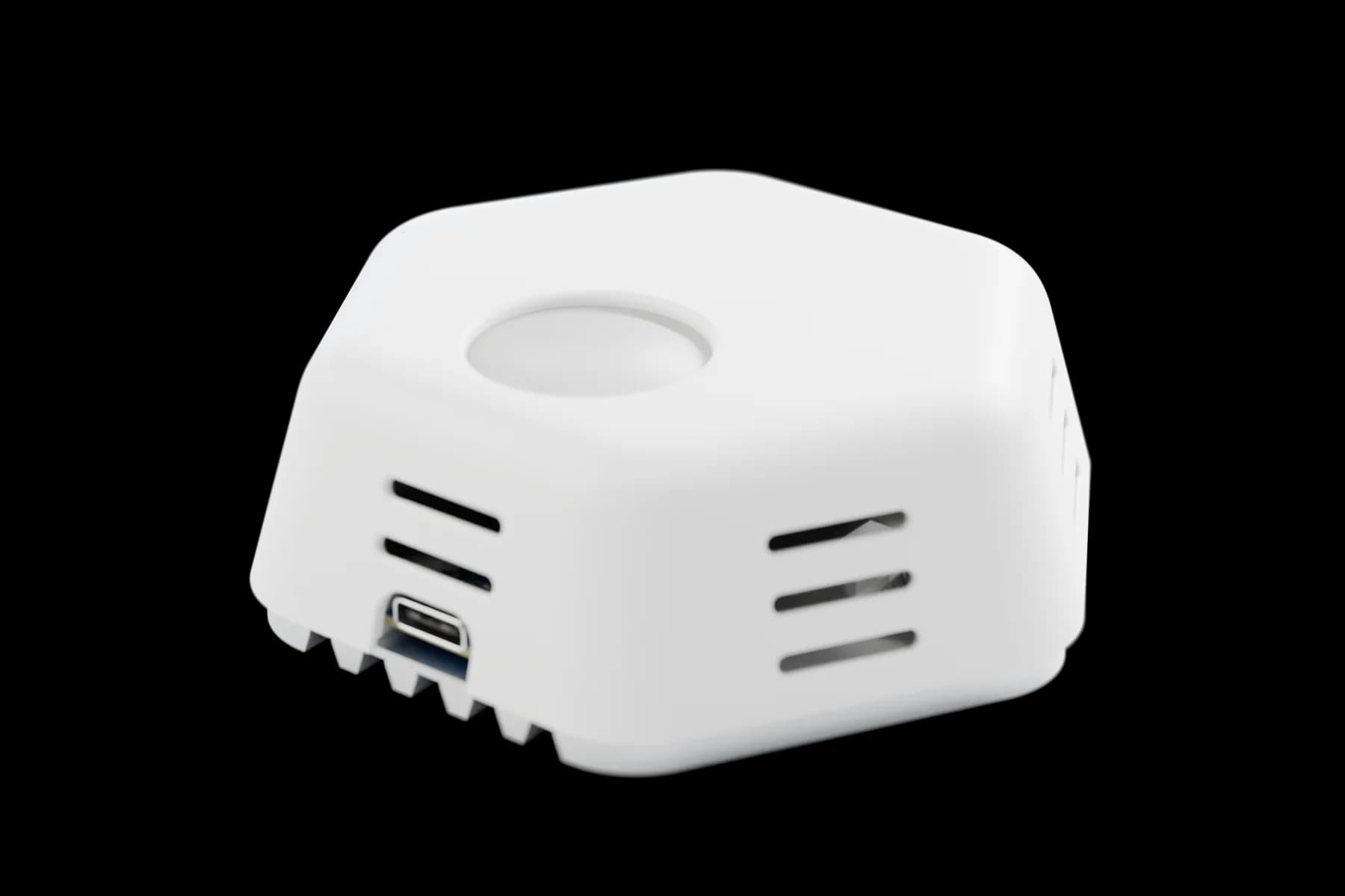 iThermal, assembled: a white hexagonal enclosure with side vents and a translucent window on top